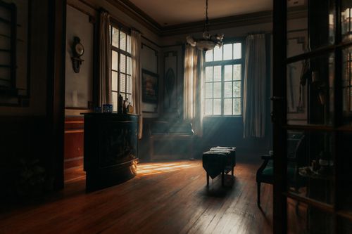 Free A vintage-style room interior in Buenos Aires with soft light streaming through the window. Stock Photo