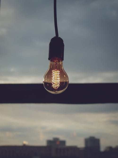 Free Turned-on Brown Light Bulb Stock Photo