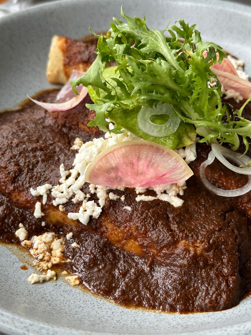 Enmoladas de Pollo con Mole y Queso Fresco