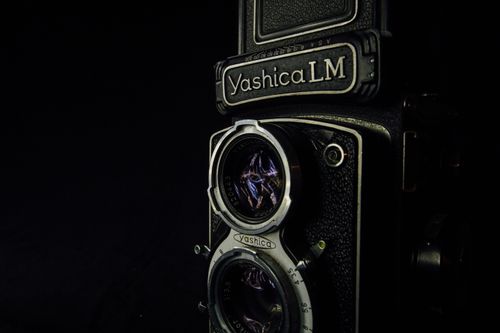Free Close-up of a classic Yashica LM twin-lens reflex camera showcasing vintage photography equipment. Stock Photo