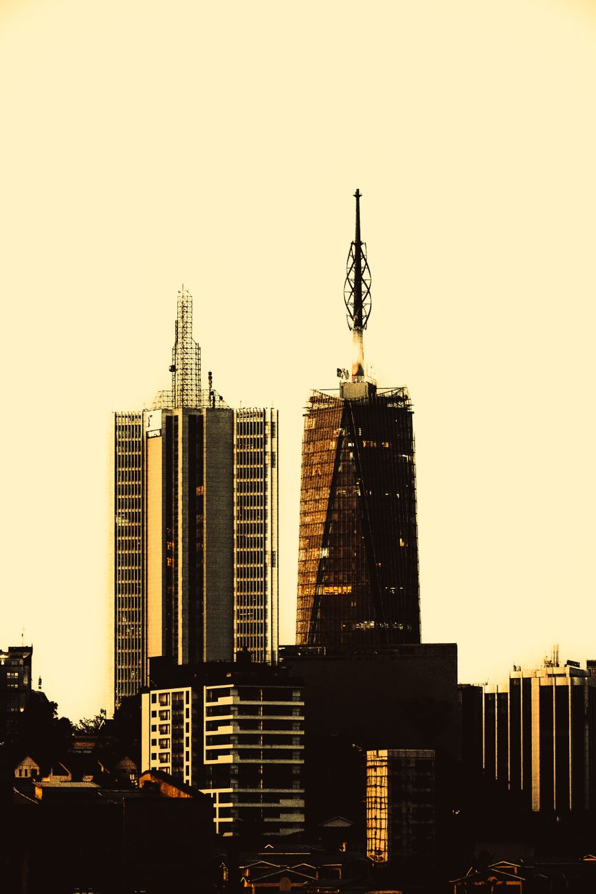 Nairobi Kenya skyline at sunset with Kenyatta International Convention Centre illuminated