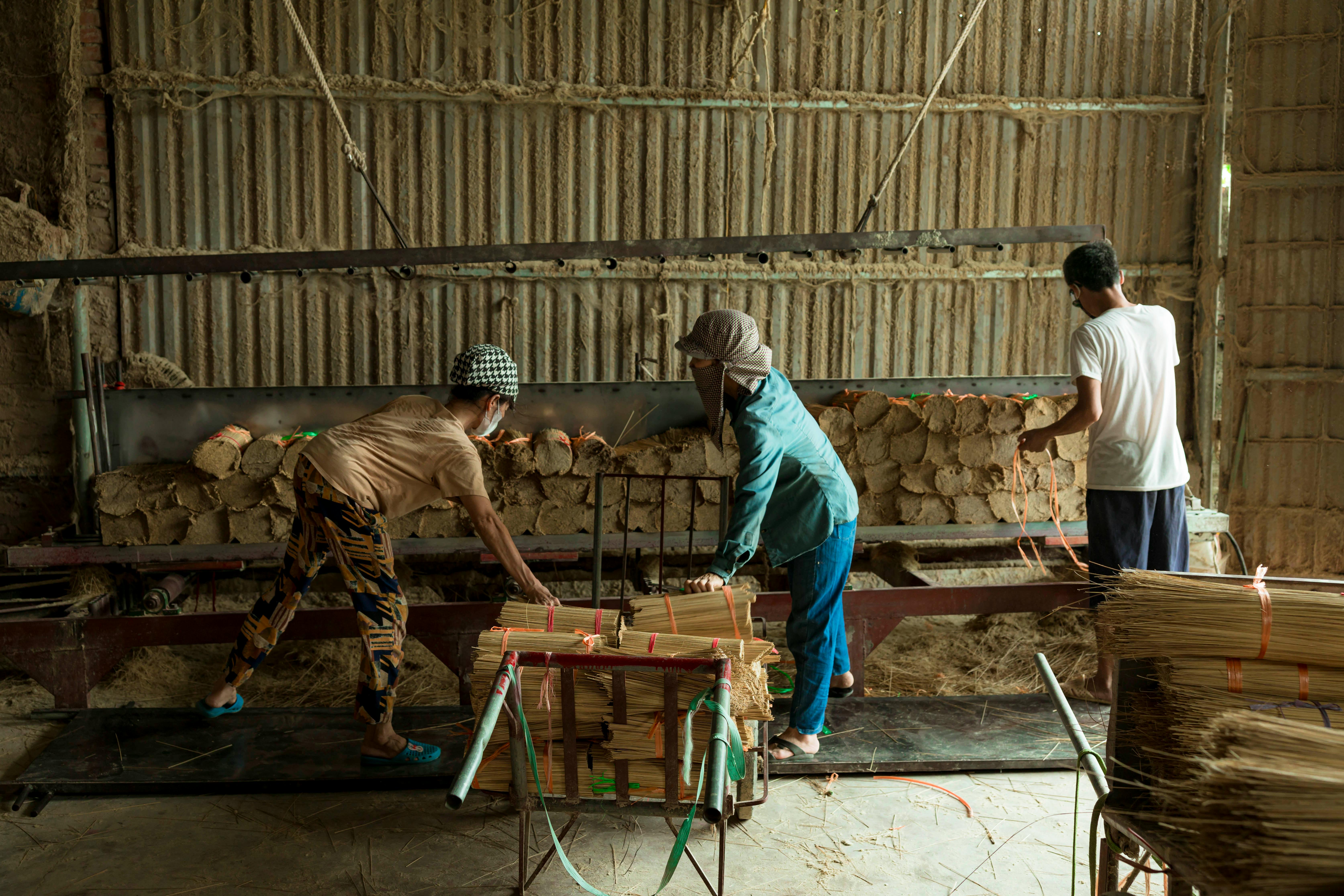 Group of people working in a factory
