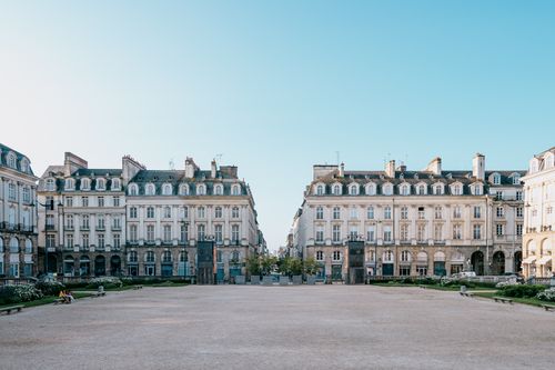 Free Classic architecture at Rennes Parliament Square under clear blue skies. Stock Photo