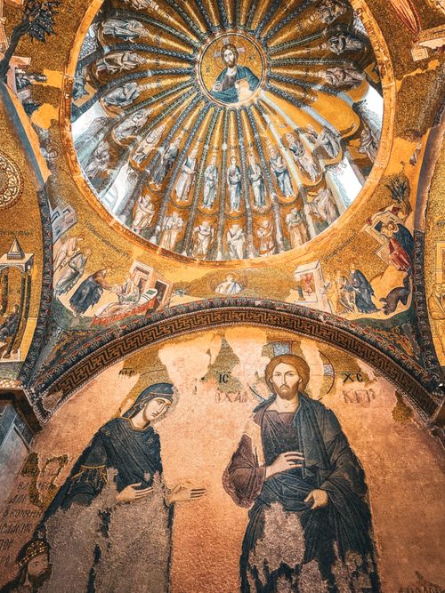 Free Intricate Byzantine mosaic artwork depicting religious figures in a historic church ceiling. Stock Photo