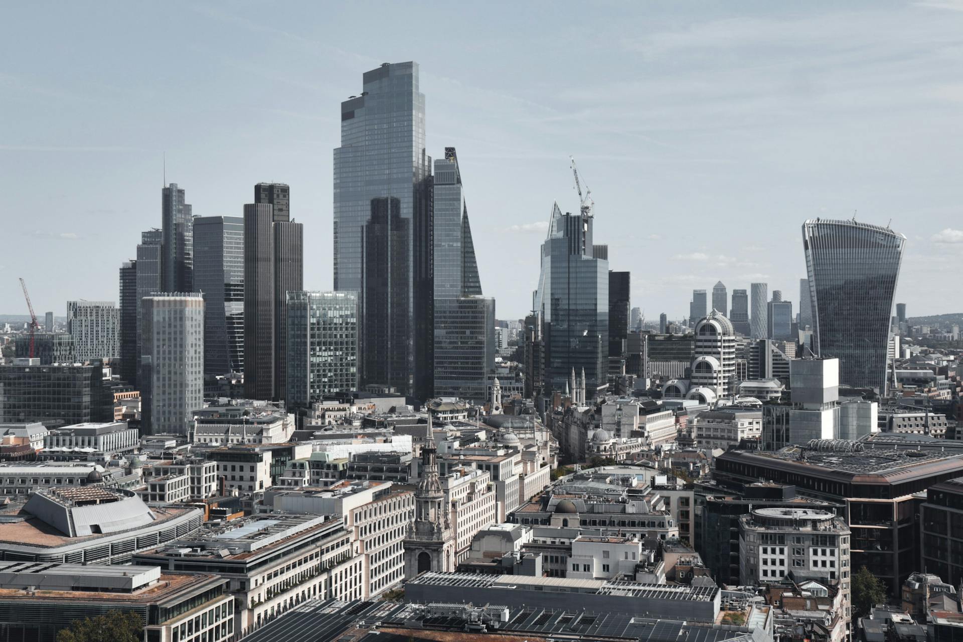 Aerial perspective on the City of London (Square Mile) with Canary Wharf skyscrapers in the background