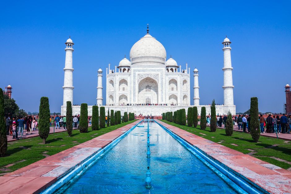 Frontal view of the Taj Mahal in Agra, India, under clear blue skies.