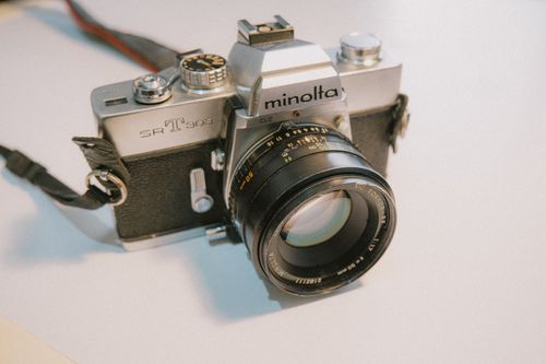 Free Classic Minolta SR-T 303 camera showcasing vintage film photography charm. Stock Photo