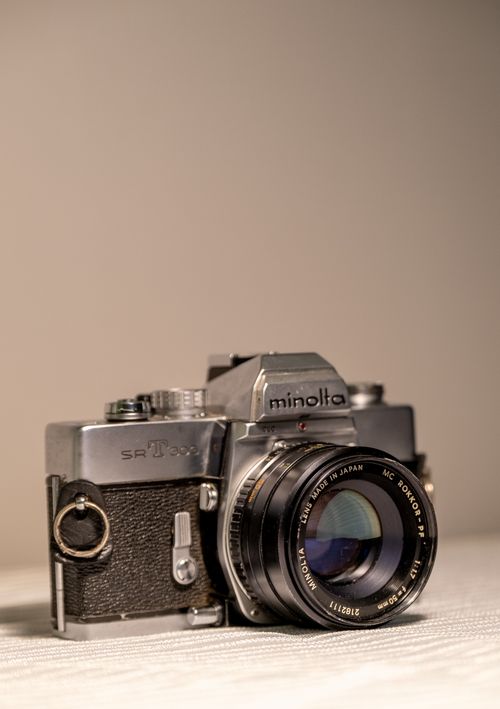 Free Classic Minolta SLR camera showcasing vintage photography equipment. Stock Photo