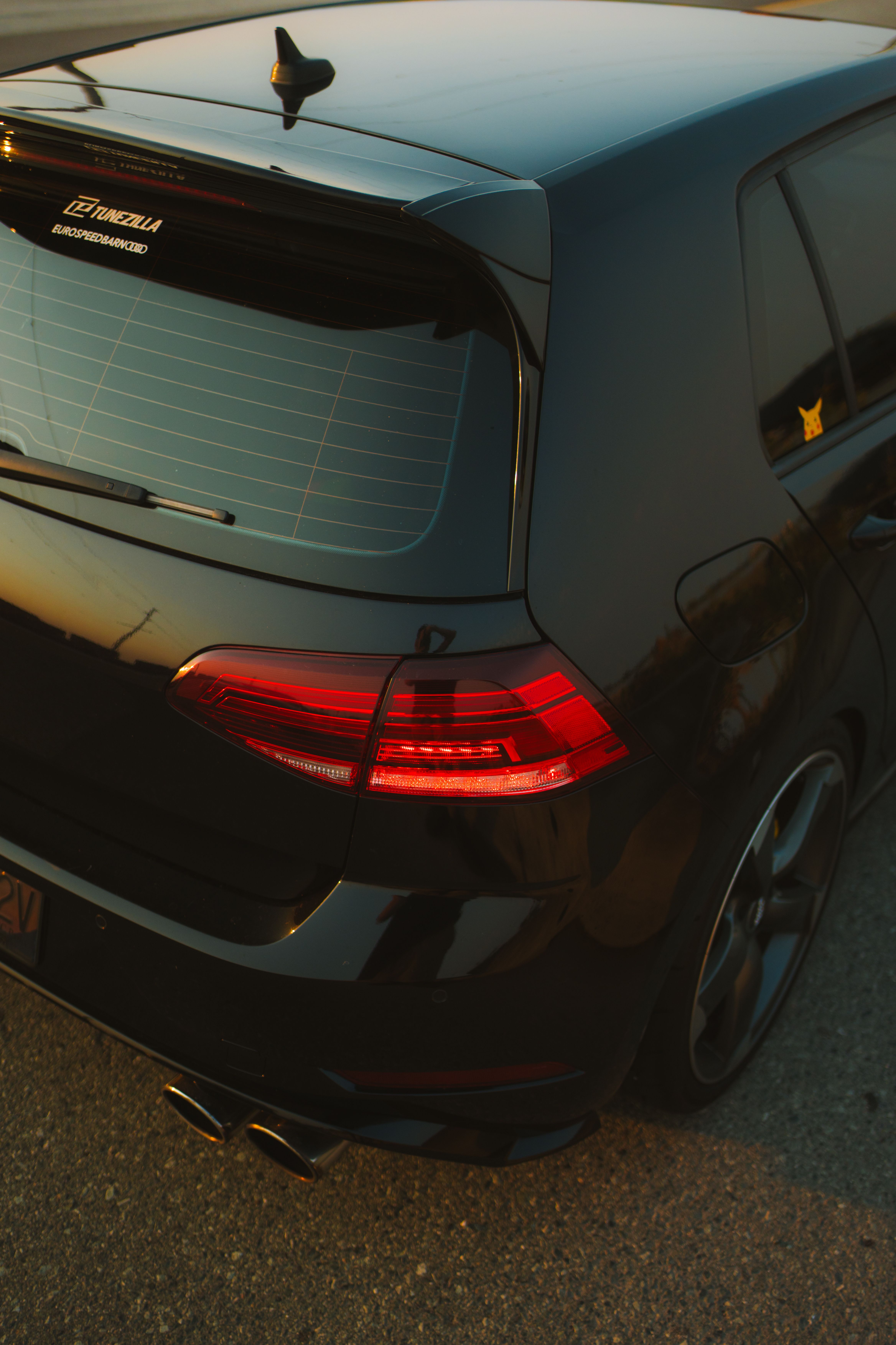 The rear end of a black golf · Free Stock Photo