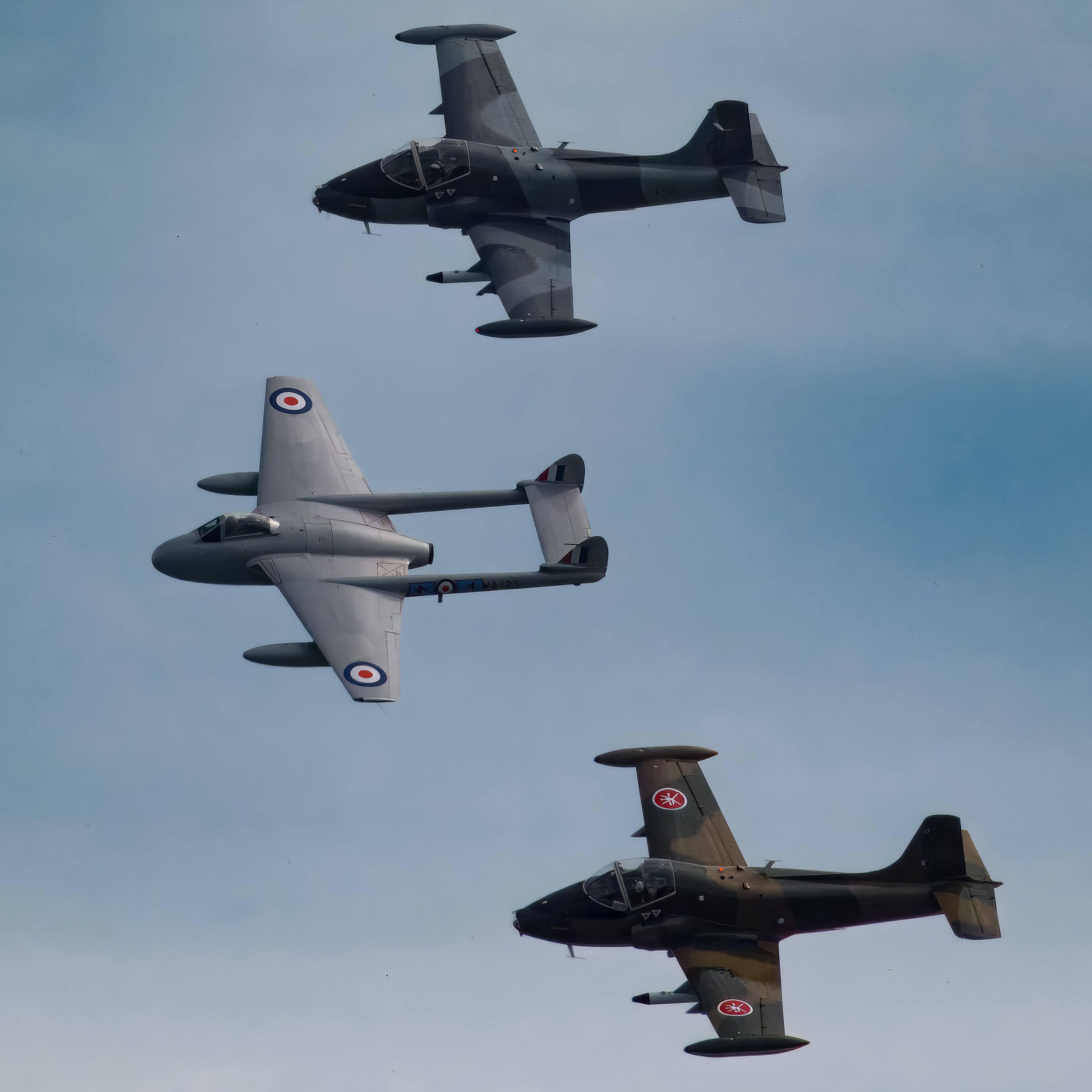 Three fighter jets flying in formation in the sky · Free Stock Photo