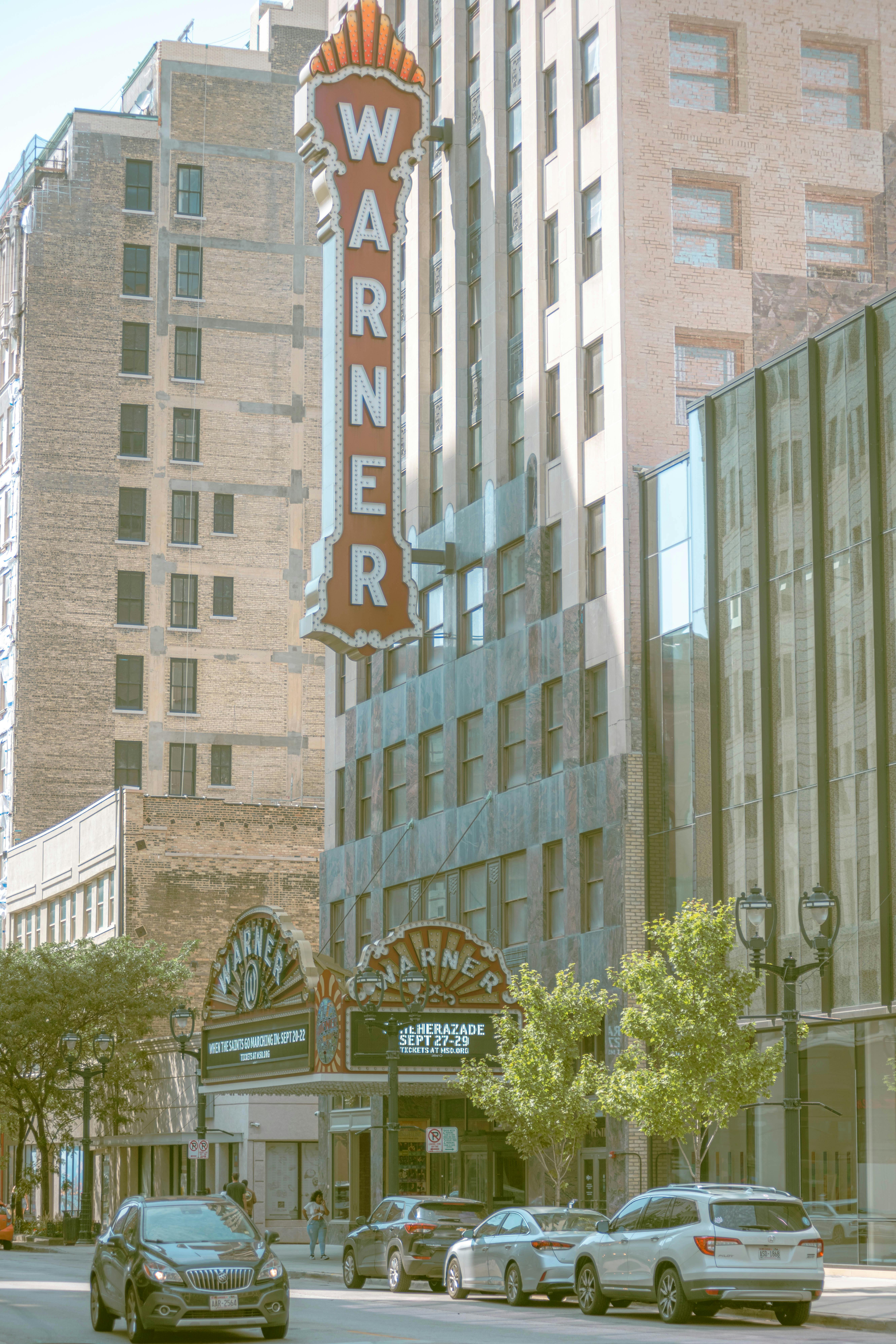 Free Street view of iconic Warner Theatre in Milwaukee, showcasing urban architecture. Stock Photo