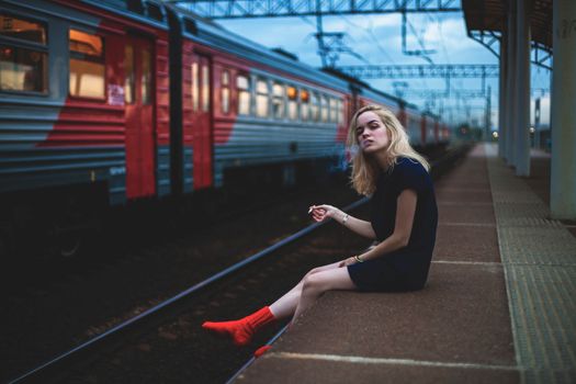 Person Sitting On Platform