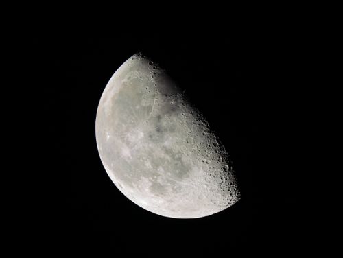 Free A captivating view of the waning gibbous moon against a clear night sky in Darien, Connecticut. Stock Photo