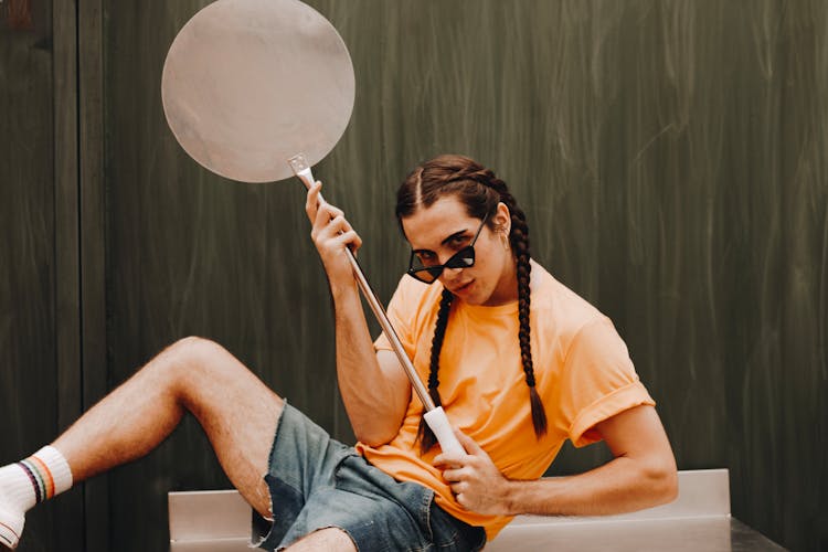 Man Holding Large Ladle