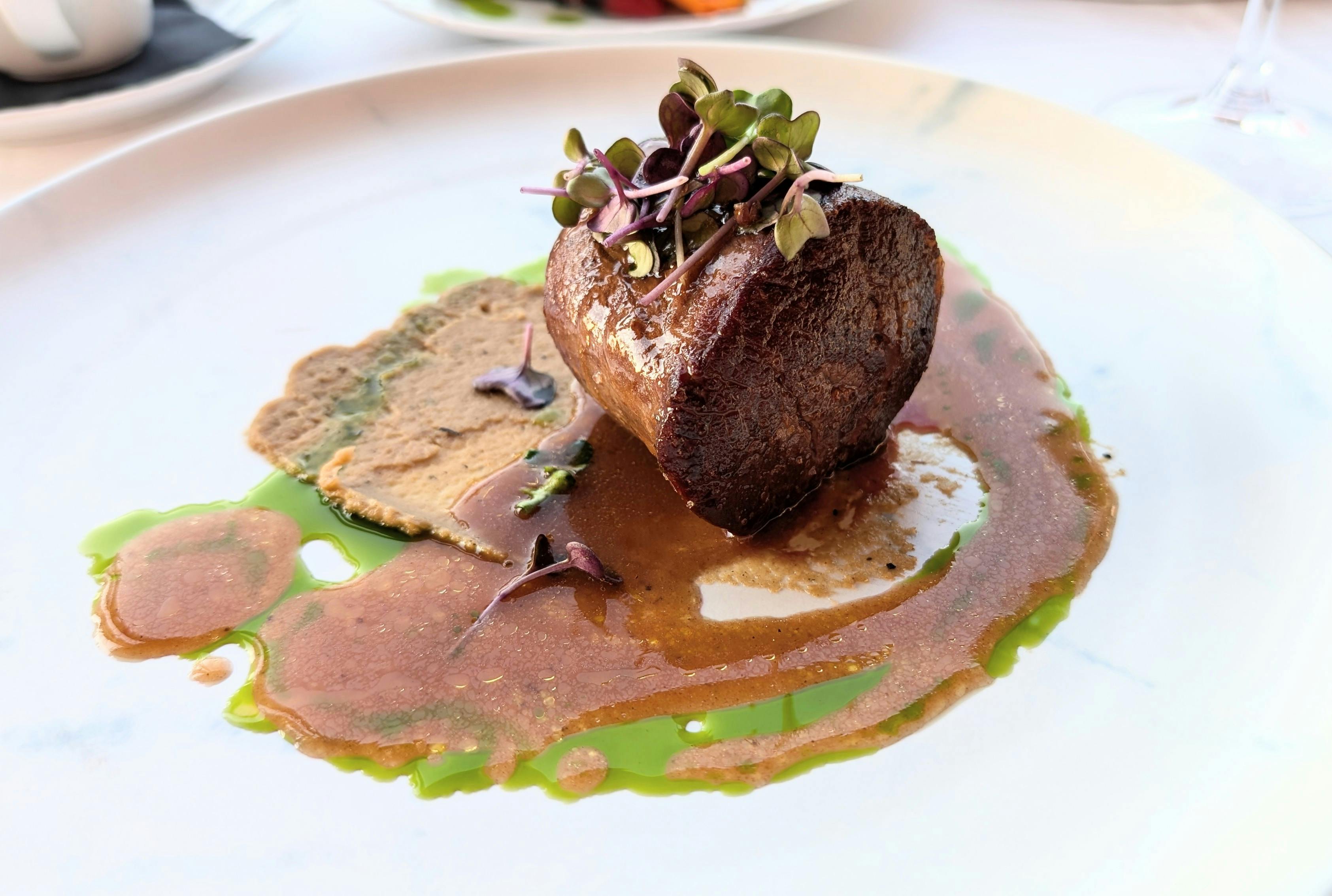 A perfectly cooked steak at a high-end restaurant - Downtown Detroit fancy restaurants