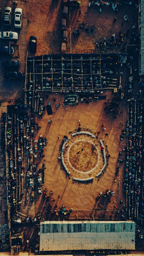 Free Aerial photograph capturing a vibrant market event in Kano, Nigeria from above, highlighting cultural dynamics. Stock Photo