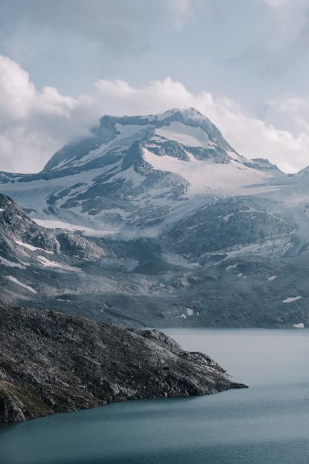 A mountain range with a lake in the middle