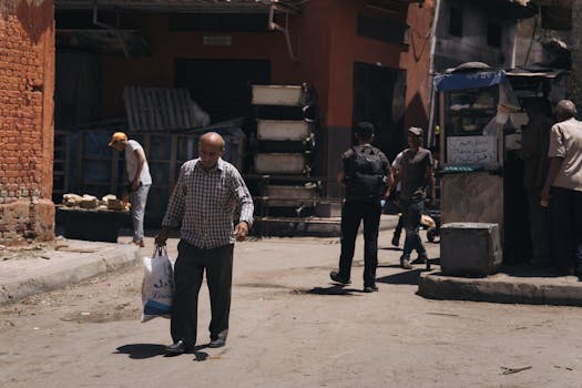 Daily life in Alexandria's bustling street market, capturing local culture and interactions.