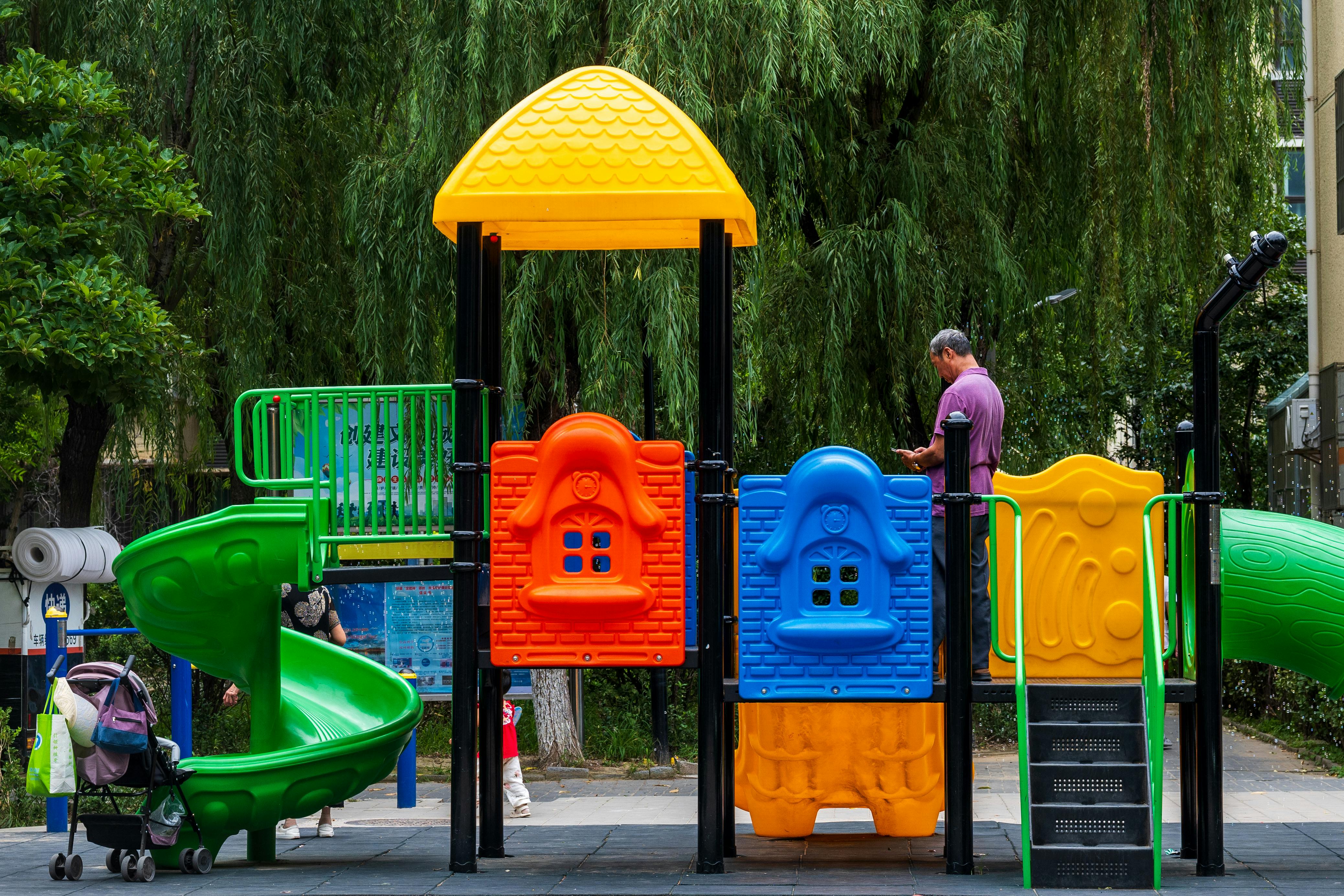 a playground with colorful slides and play equipment