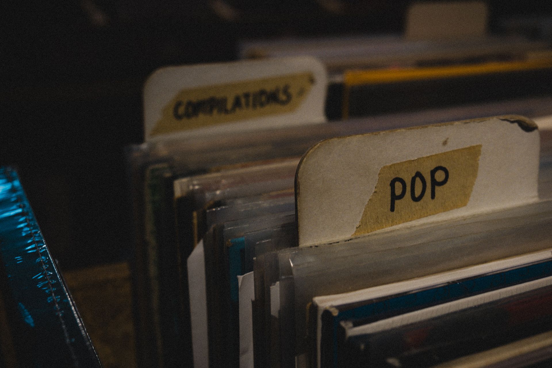 A stack of records with the word pop on them