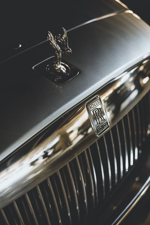 Free Elegant detail of a vintage Rolls Royce grille with iconic emblem. Stock Photo