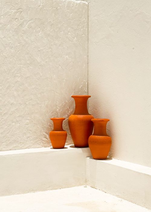 Free Three terracotta vases on a white shelf in São Paulo, Brazil. Stock Photo