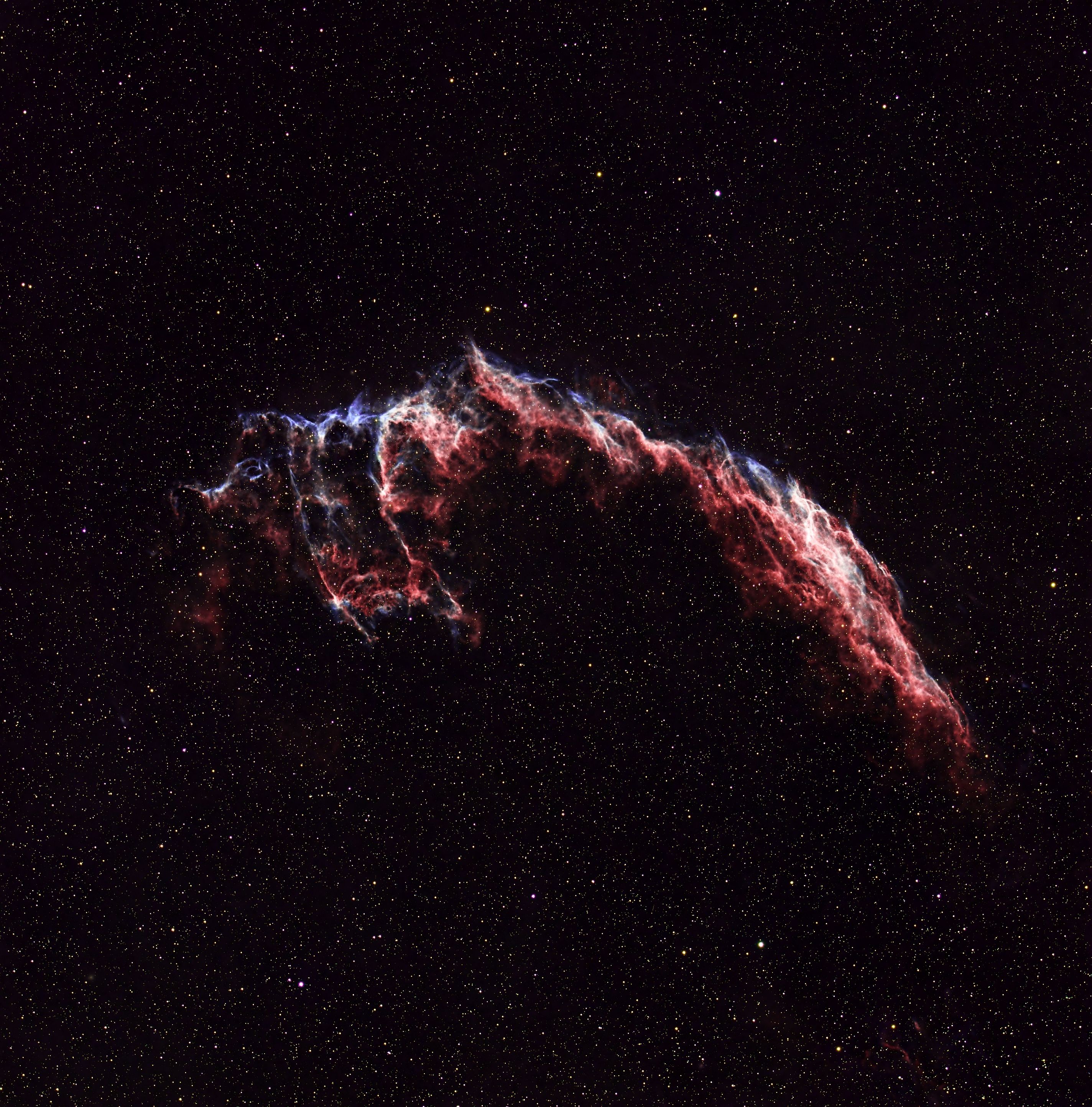 Capture of the vibrant Eastern Veil Nebula in night sky.