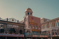 A city street with buildings and a clock tower