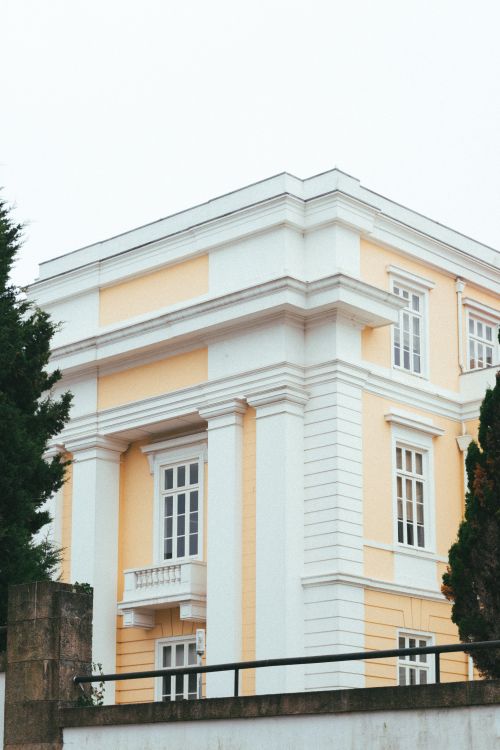 Free Classic neoclassical facade of a luxurious building in Porto, Portugal, featuring detailed architecture. Stock Photo