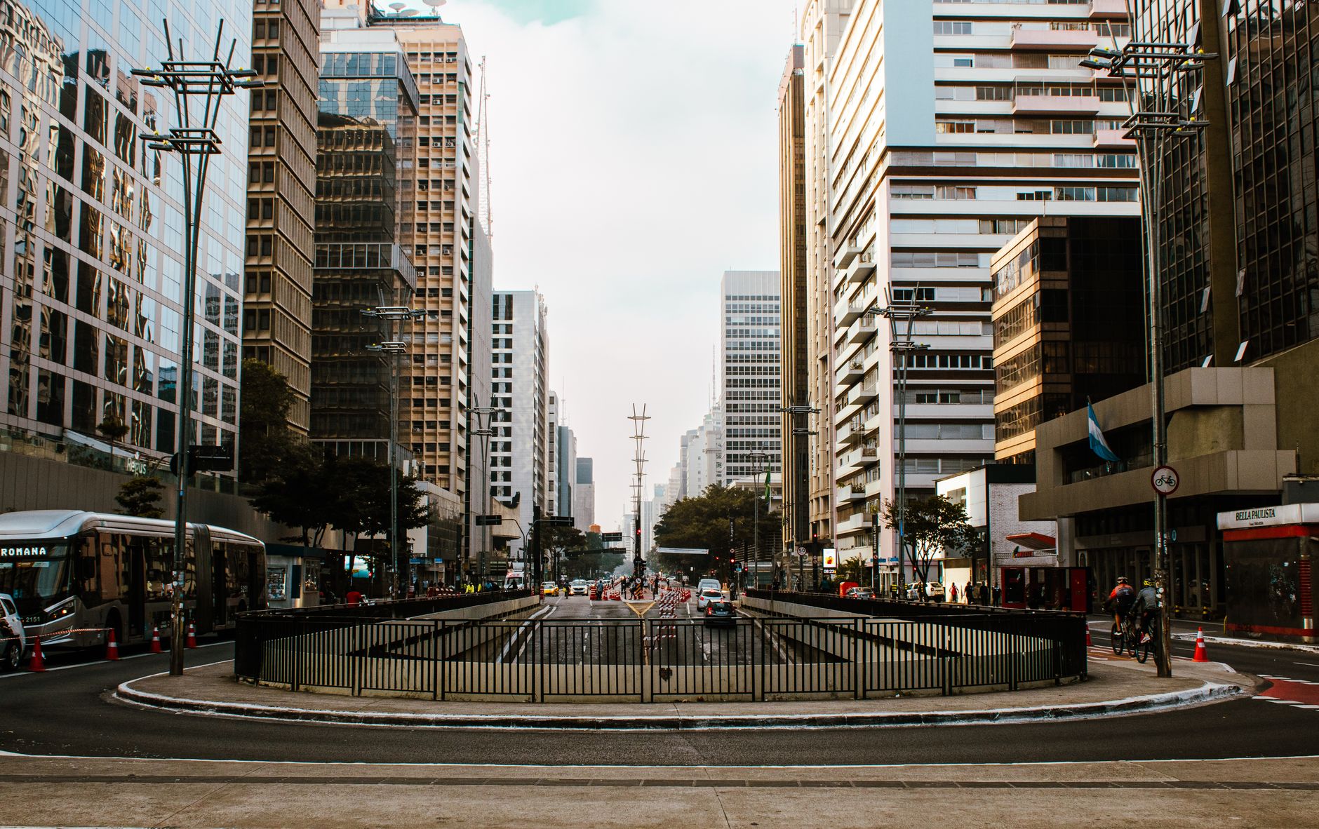 Vibrant cityscape of São Paulo with bustling traffic and modern skyscrapers, highlighting urban architecture.