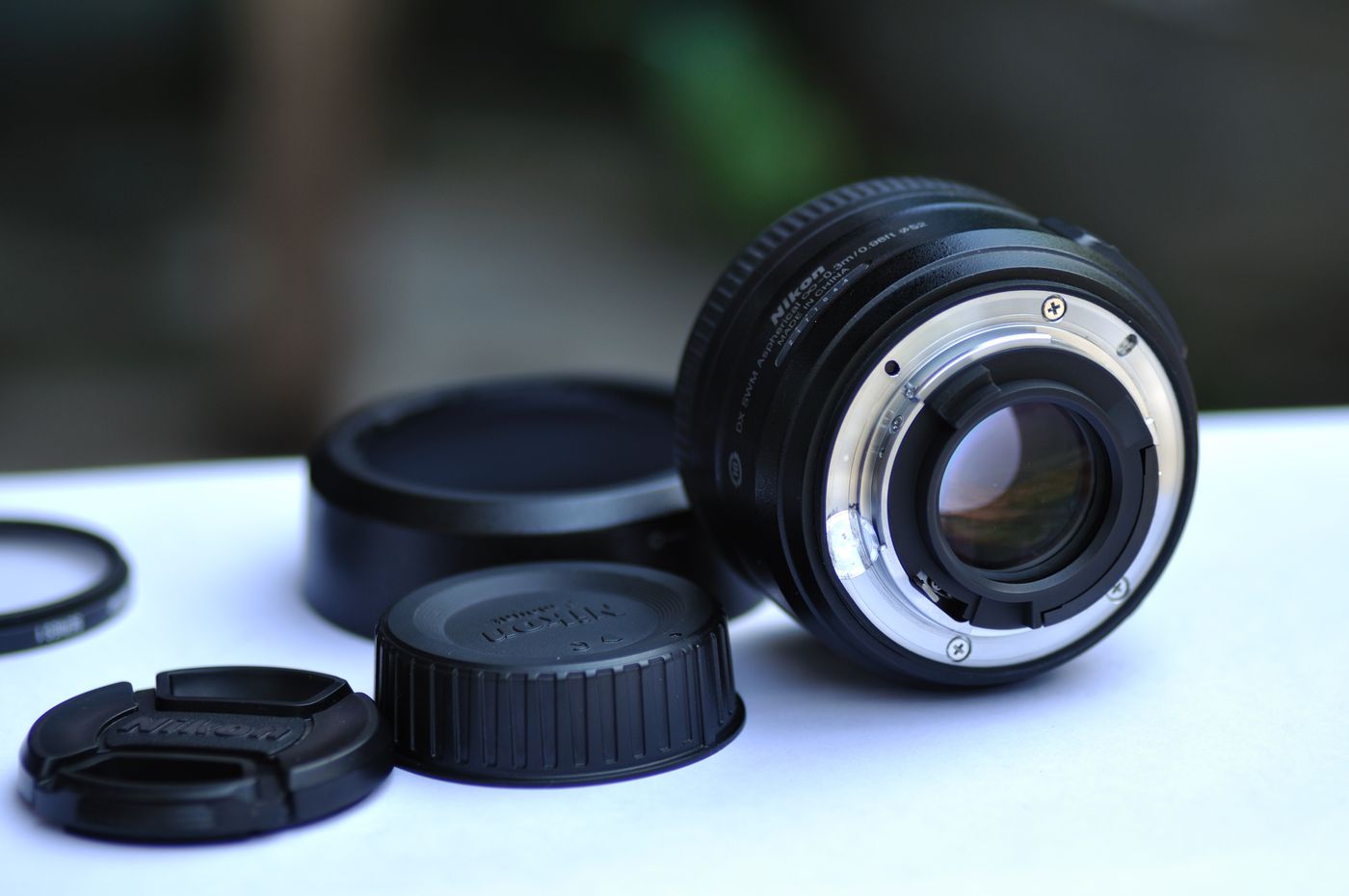 Camera lens and accessory components prepared for adapter compatibility testing