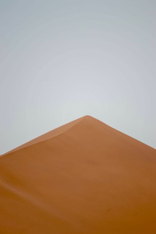 Sand dune ridge, photo by AbduRahman Ibn Riad on Pexels