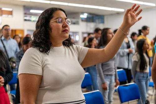 Free People of various ages worship together in a church in Ciudad de México. Stock Photo
