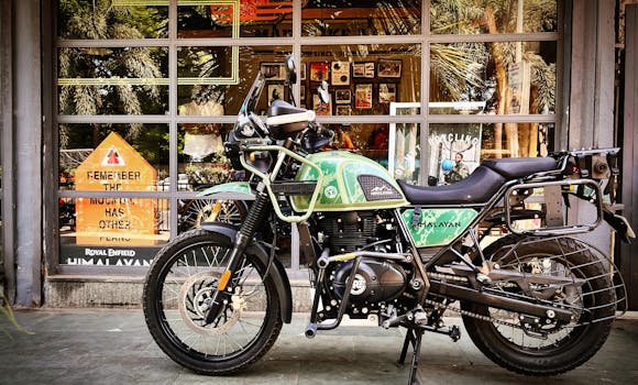 A classic Royal Enfield Himalayan motorcycle displayed outdoors in a vintage setting in Mumbai, India.