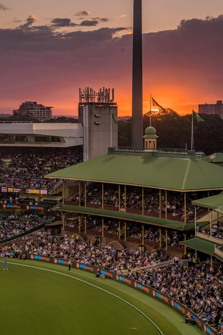 Audience On A Stadium During Dusk 