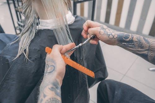 Person Cutting Hair