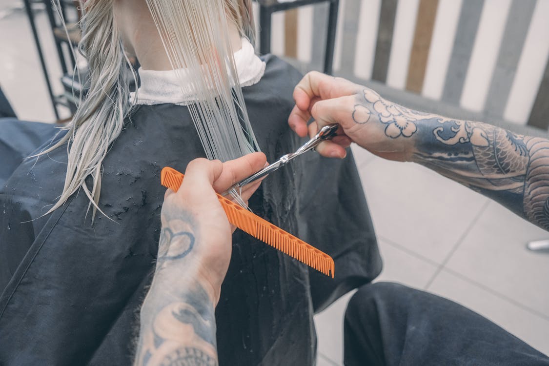 Free Person Cutting Hair Stock Photo