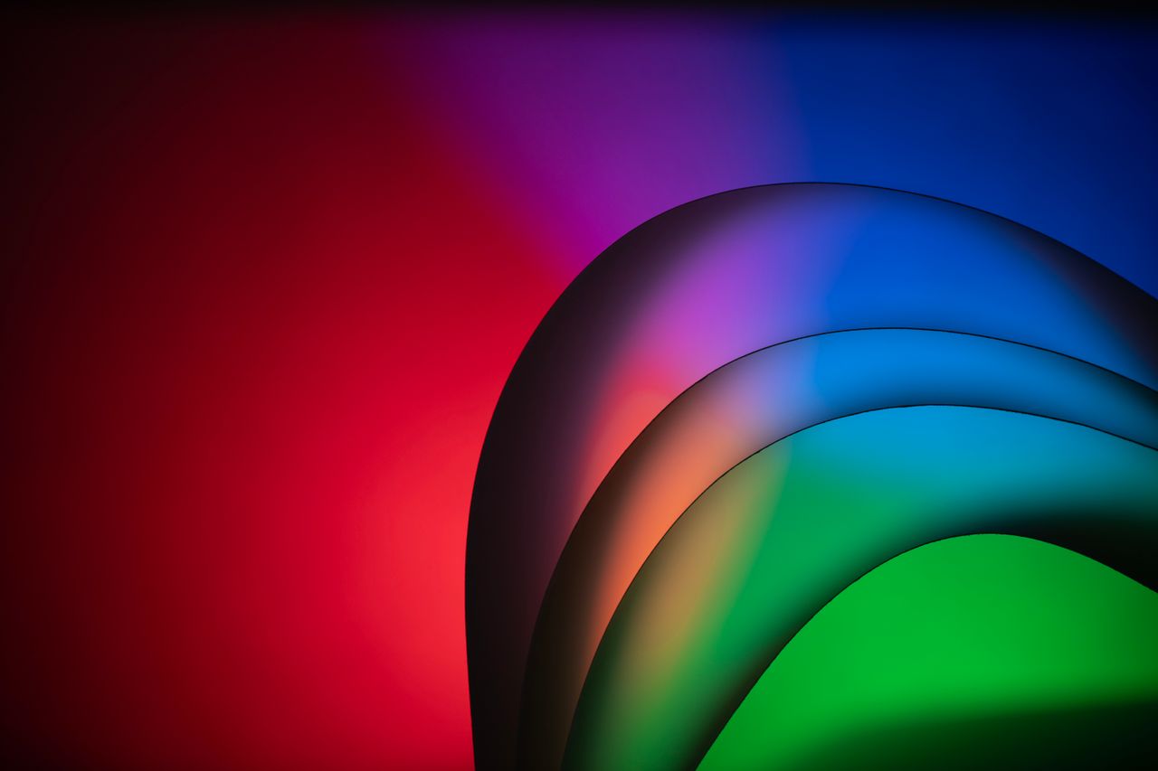 vibrant and colorful abstract gradient design with curved shapes for c