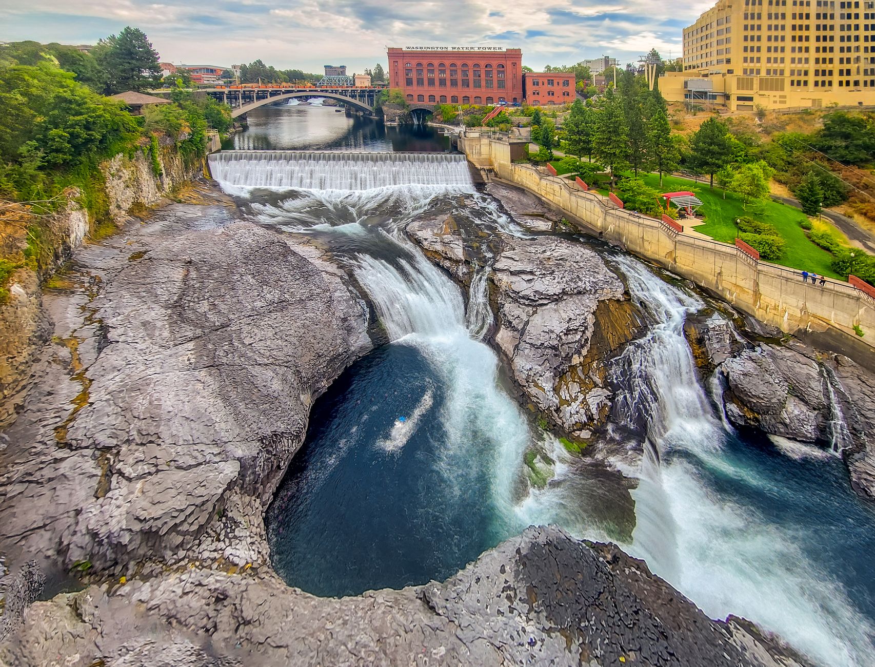 A breathtaking aerial photo of Spokane Falls with natural beauty and urban landscape.