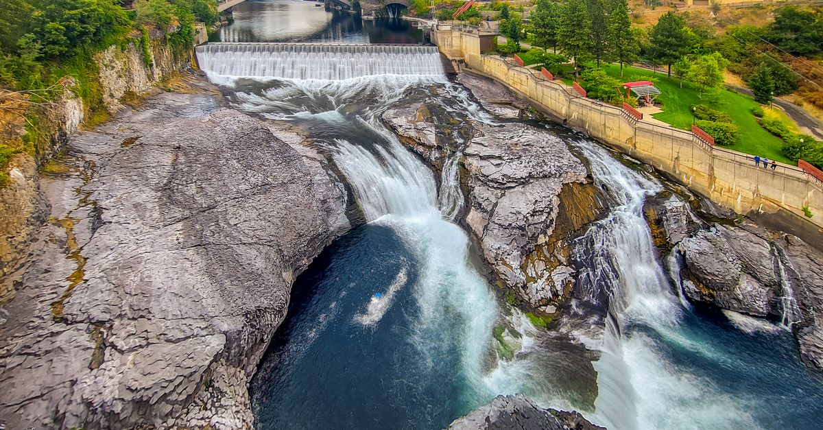 A breathtaking aerial photo of Spokane Falls with natural beauty and urban landscape.