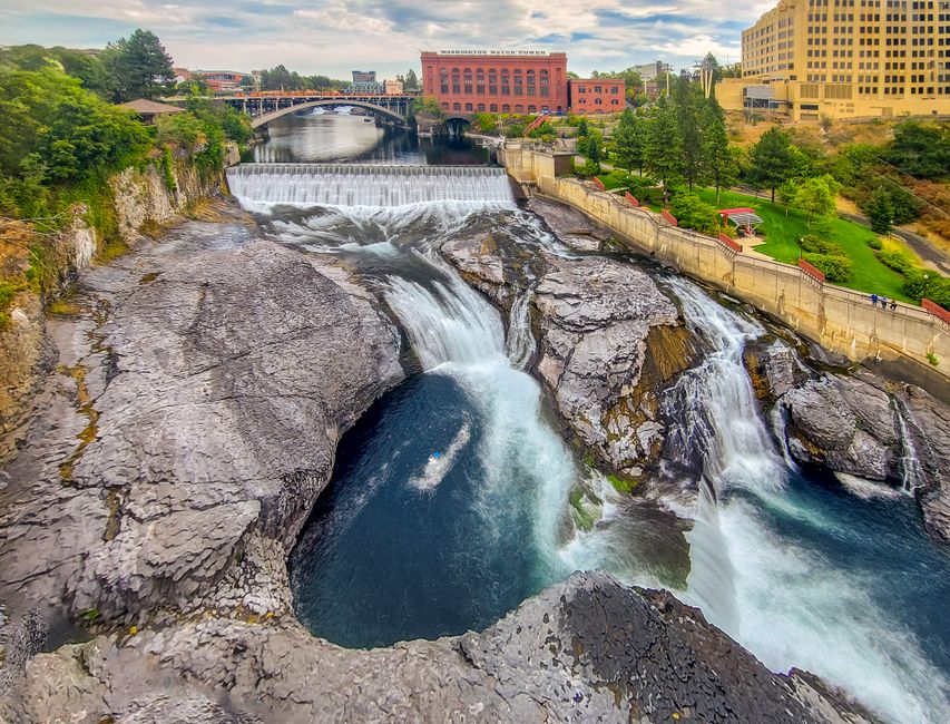 A breathtaking aerial photo of Spokane Falls with natural beauty and urban landscape.