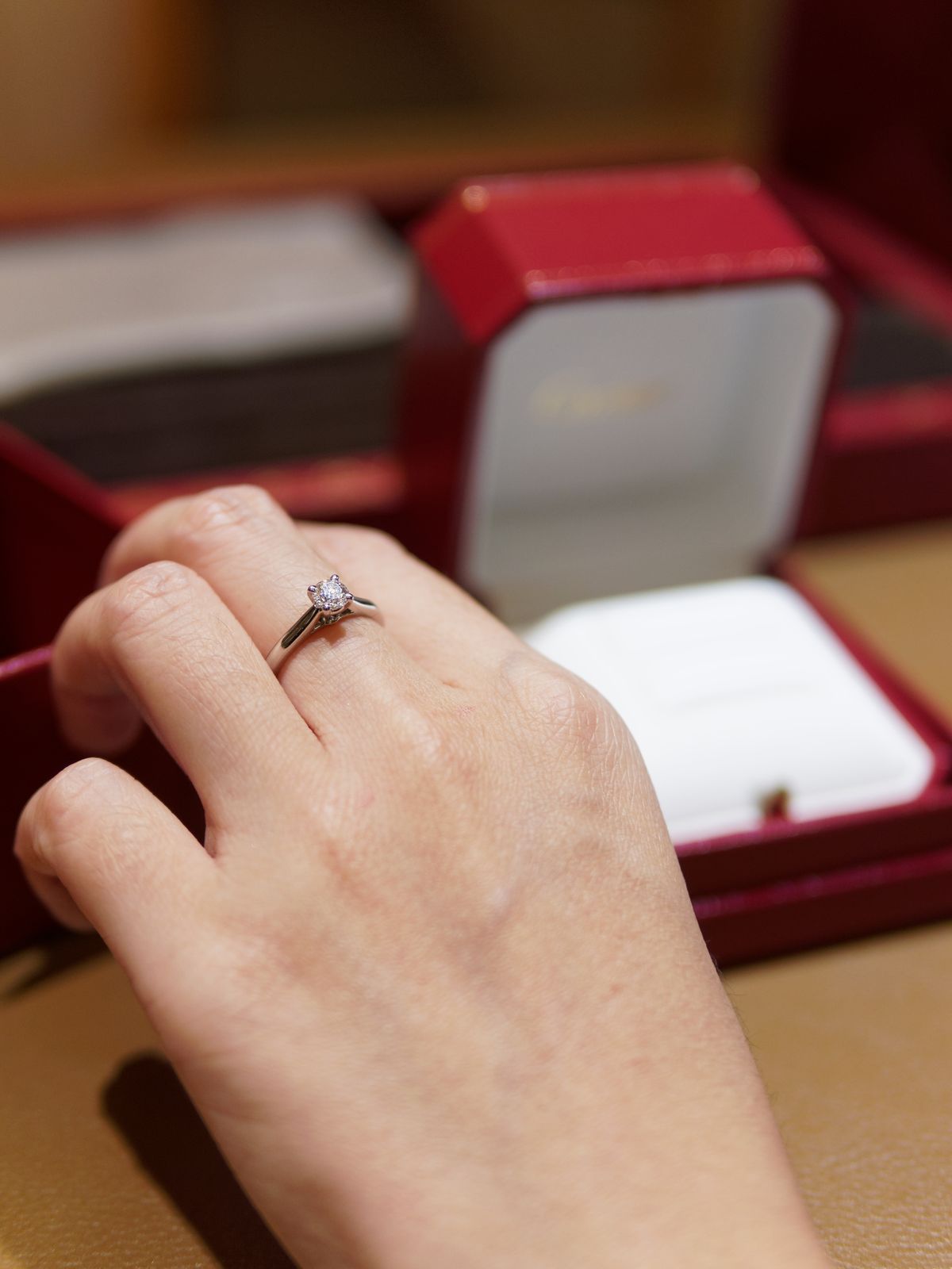 Diamond engagement ring worn on a hand for an everyday jewelry look