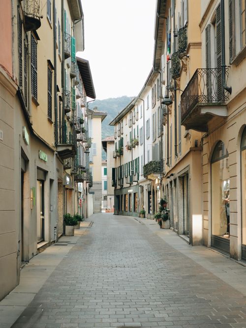 Free Discover the charm of Lombardy's cobblestone streets in Milan's historic urban setting. Stock Photo