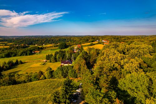 Free Aerial view of the lush rural landscape of Maglenča, Croatia, with forests and fields. Stock Photo