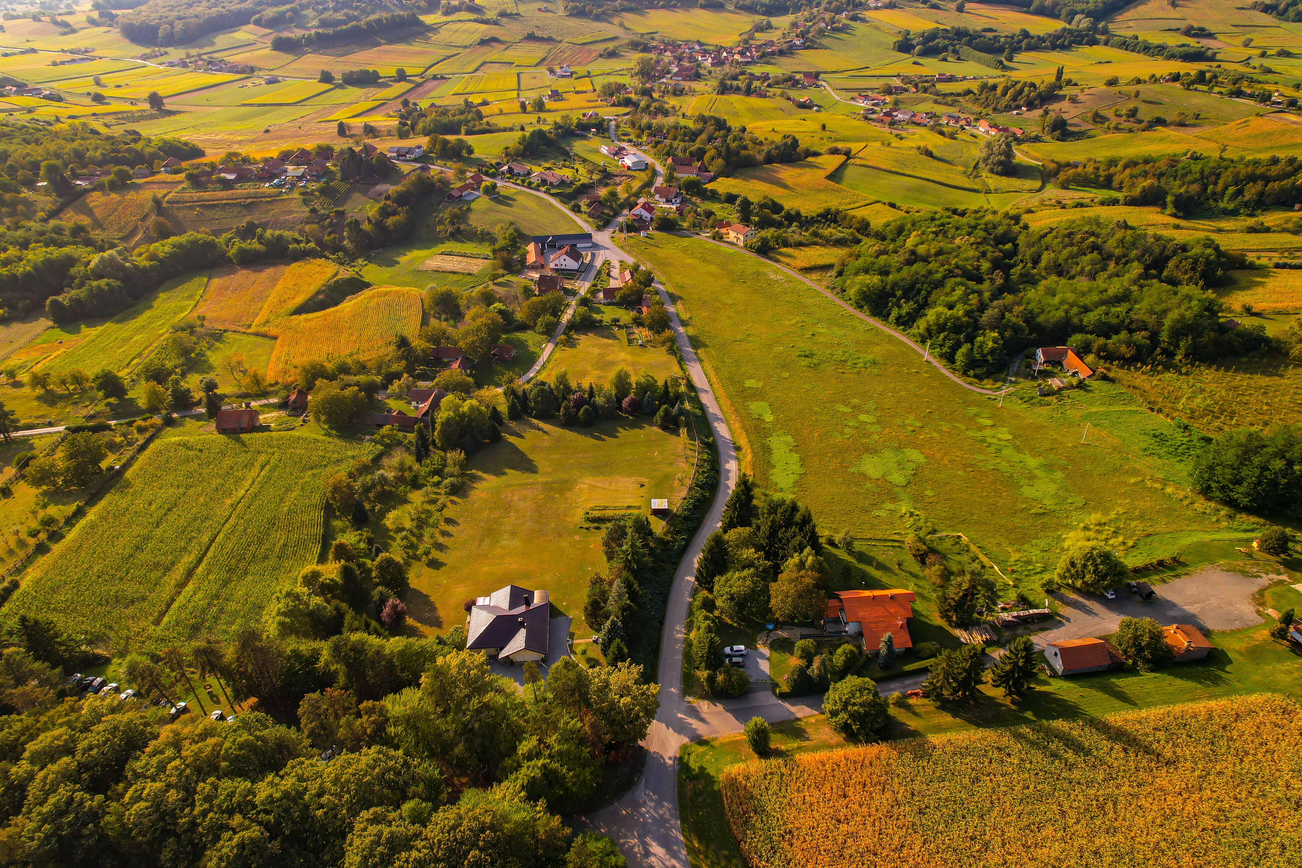 Scenic aerial view of farmland and countryside in Bjelovarsko-bilogorska, Croatia. Scenic aerial view of farmland and countryside in Bjelovarsko-bilogorska, Croatia.
