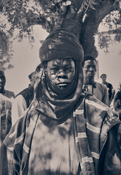 Free A man in traditional attire at an outdoor cultural gathering in Gombe, Nigeria. Stock Photo