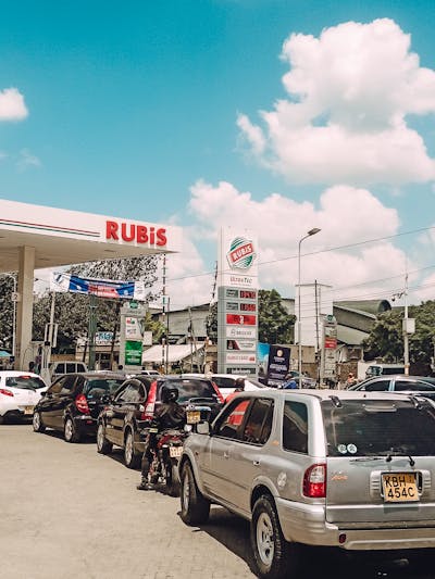 A street scene in Nairobi featuring individuals wearing bold, colorful outfits.