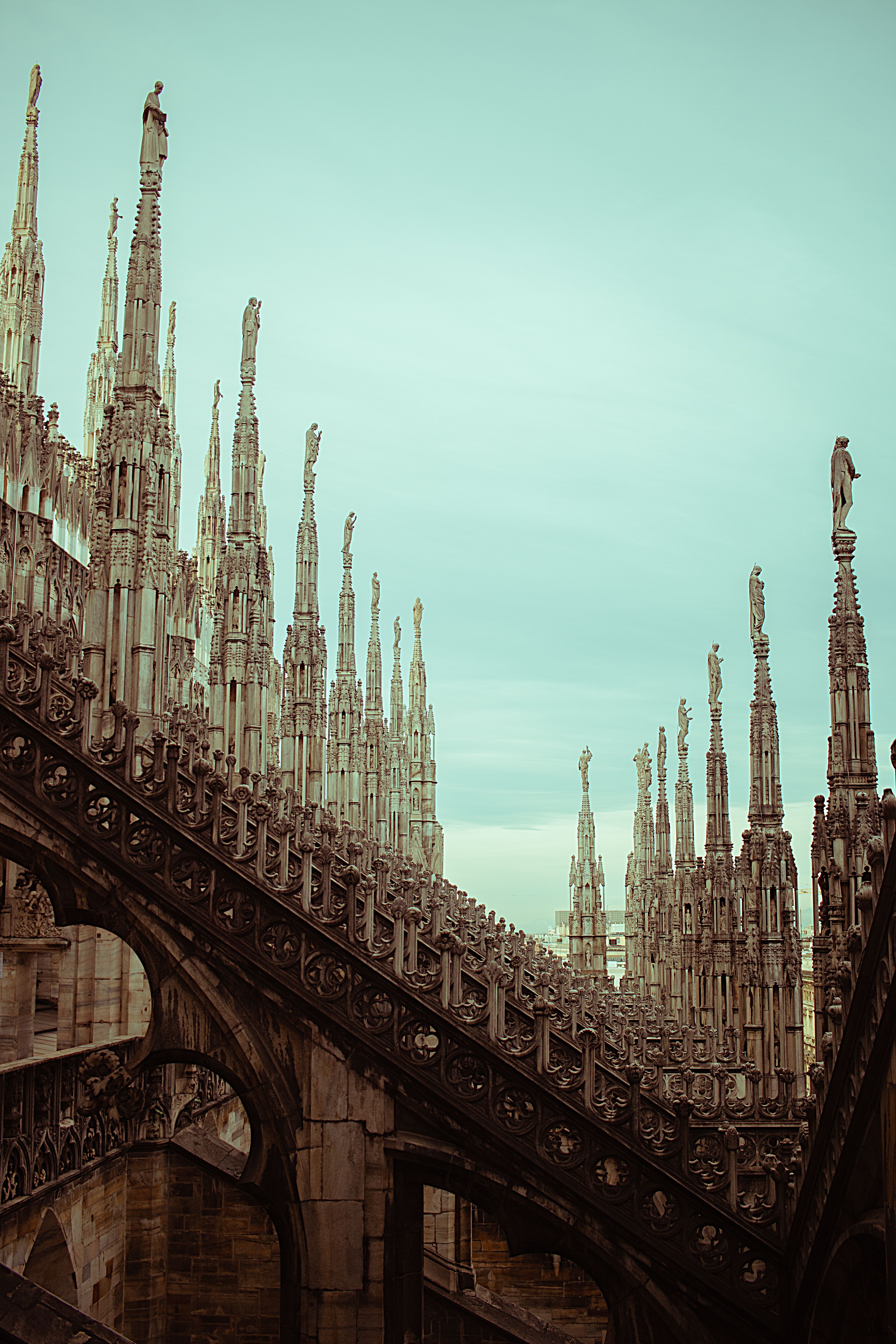 Explore the intricate Gothic architecture of Milan Cathedral in this striking image.