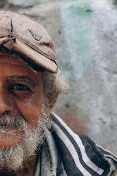Close-up of an elderly man with a cap, captured in Alexandria, Egypt.