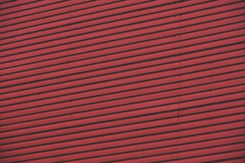 Red Wall Made Of Corrugated Steel